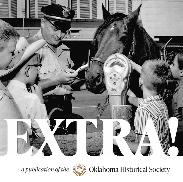 A police officer writes a parking meter fine ticket to a horse as four boys, some in Western gear look on.