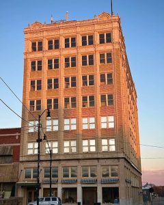Commerce Building in Olkmulgee seven story Beaux Arts building.