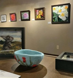 Brushes in the Heartland Exhibit paintings and woolen creations