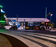 EMBARK bus driving by Paycom Center in Downtown OKC