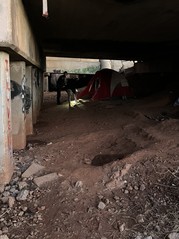 person experiencing homelessness talking with Point in Time volunteers