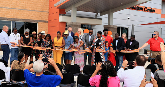 Mayor Holt, Councilwoman Nice and others cutting ribbon for the Willa D Johnson Rec Center