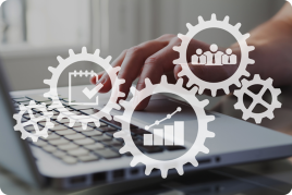 Gear symbols in front of laptop