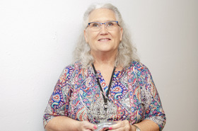 Marissa Sockwell holding award