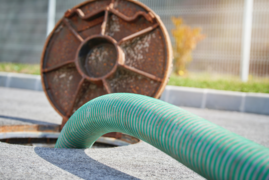 Sewer with cleaning tube