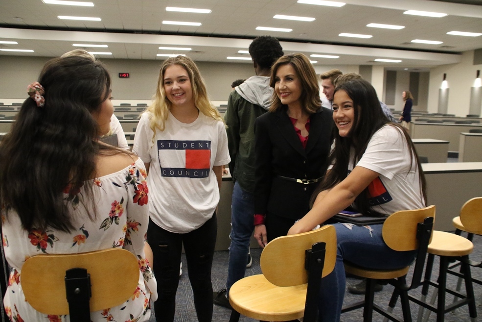 State Supt. Joy Hofmeister with students