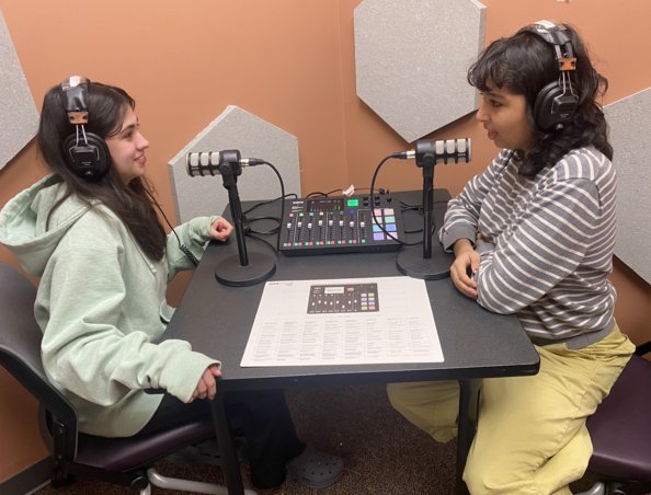 two girls podcasting