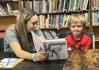 older students reads to younger student