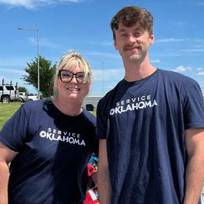 People wearing Service Oklahoma t-shirts