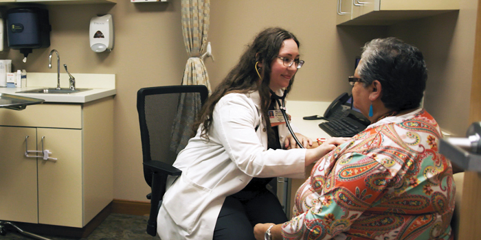Dr. Valerie Robinson, physician participant of the TSET-funded Oklahoma Medical Loan Repayment Program consults patient in Stigler, OK