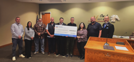 The OWRB's check presentation at the Mustang Improvement Authority.