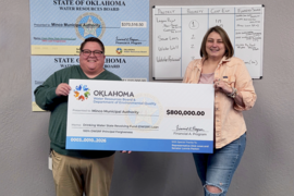 The OWRB check presentation for Minco Municipal Authority