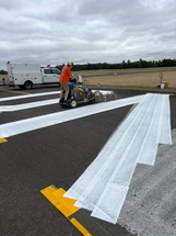 Staff painting at Mulino State Airport