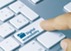 Keyboard key with a file folder that says digital accessibility