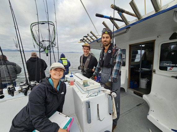 Volunteer biological assistant Laura Jost with Ryan Fields and Dylan Gomes