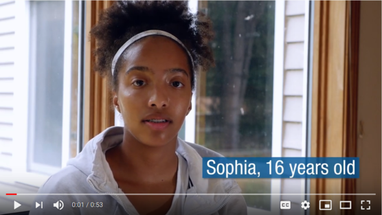 Screenshot of video with young person talking. 