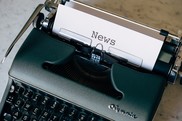 Image of typewriter with "news" on the page