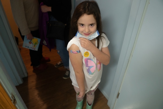 Photo of Jasmine Van Horne, 8 years old, after getting her first COVID-19 vaccination.