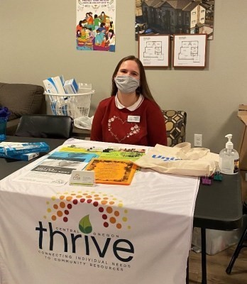 Thrive Central Oregon staffer Abigail Fate at the Madras Community Block Party and Resource Fair