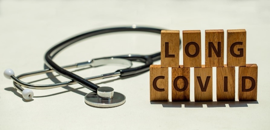wooden blocks spell out "Long COVID"