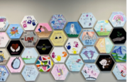 hexagonal shaped art pieces on a wall