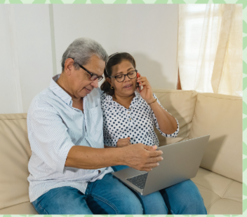 older couple on couch with phone