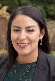 Smiling woman with shoulder length black hair
