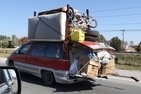 Secure your load example of overloaded vehicle
