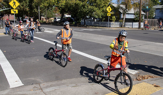 Children and bikes in crosswalk