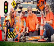 ODOT staff wearing orange with traffic cones