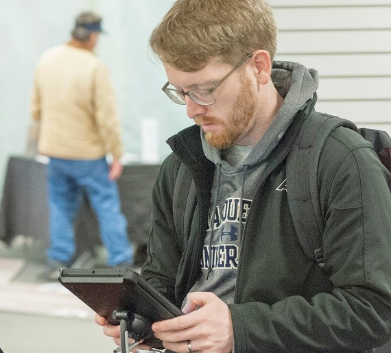 Community member participating in Open House for the Value Pricing Feasibility Study in 2018. 