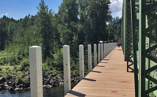 The new walkway and railing under construction. 