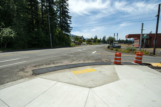 Newly constructed sidewalk curb ramp on Wa Na Pa.