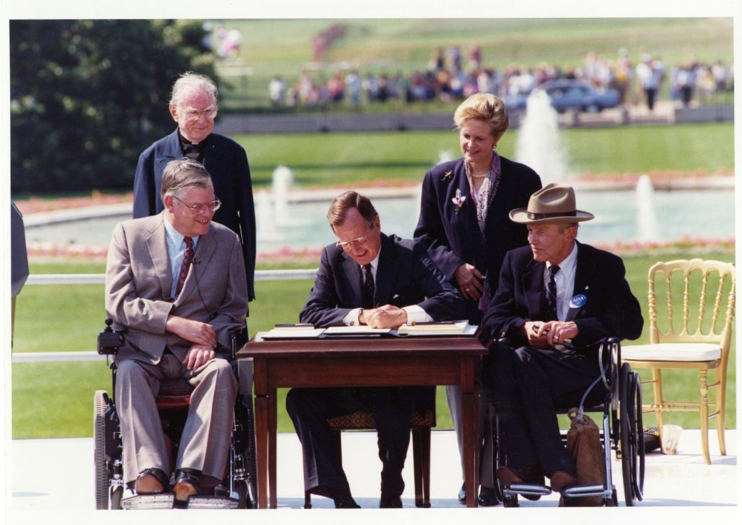George Bush signs ADA