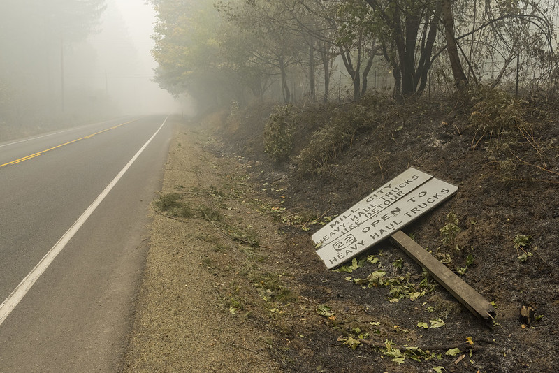 Fire damaged sign near Mill City