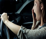 Driver yawning behind the wheel