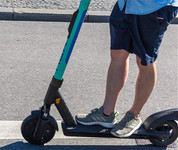 Person riding e-scooter