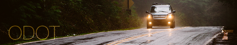 ODOT car and rain on road