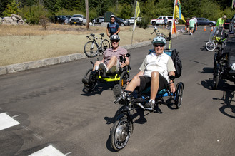 People using recumbent bikes on the trail. 