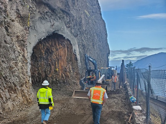 Crews excavate to form the east portal or tunnel entrance. 
