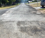 Roadway pavement in need of repair