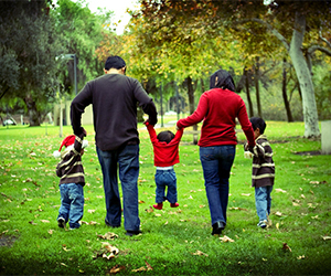 Family walking hand in hand