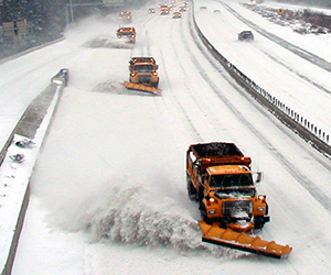 Winter plows side by side