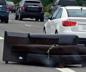 Sofa in the middle of highway