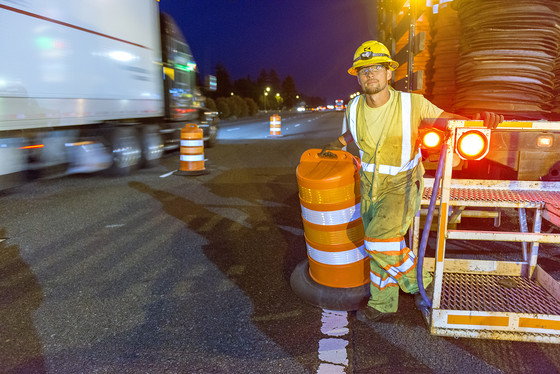 People working in highway work zone