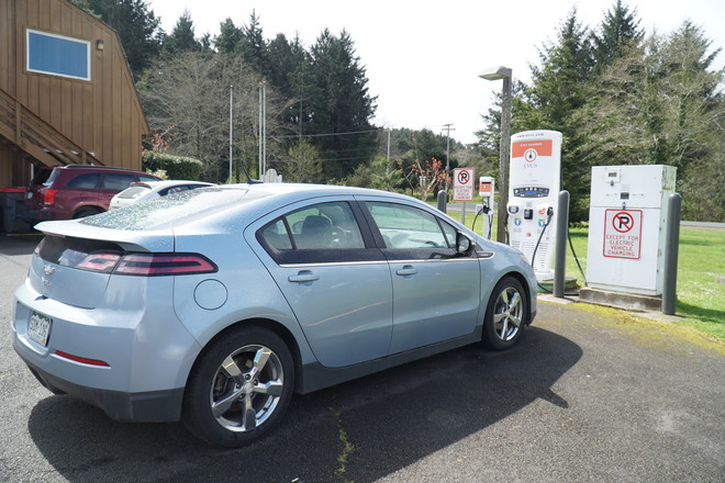 Chevy Volt recharges at a charging station in Canon Beach