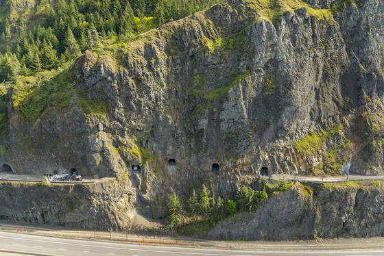 An aerial view of the tunnel entrances and five arched windows. 