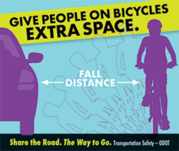 Give people on bicycles extra space. Share the road. The Way to Go.