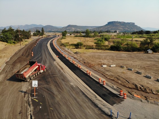 Saturday Aug 5 full closure of the roadway for construction with Lower Table Rock in the background