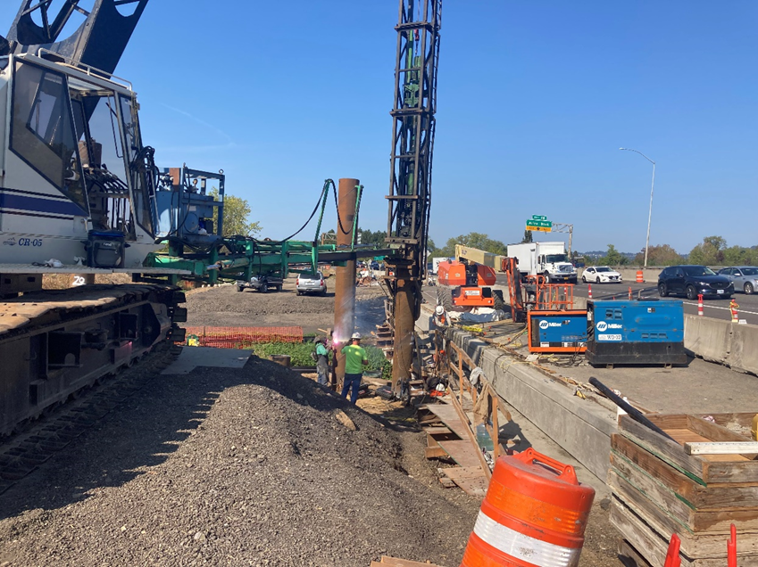 Steel columns being driven into the ground